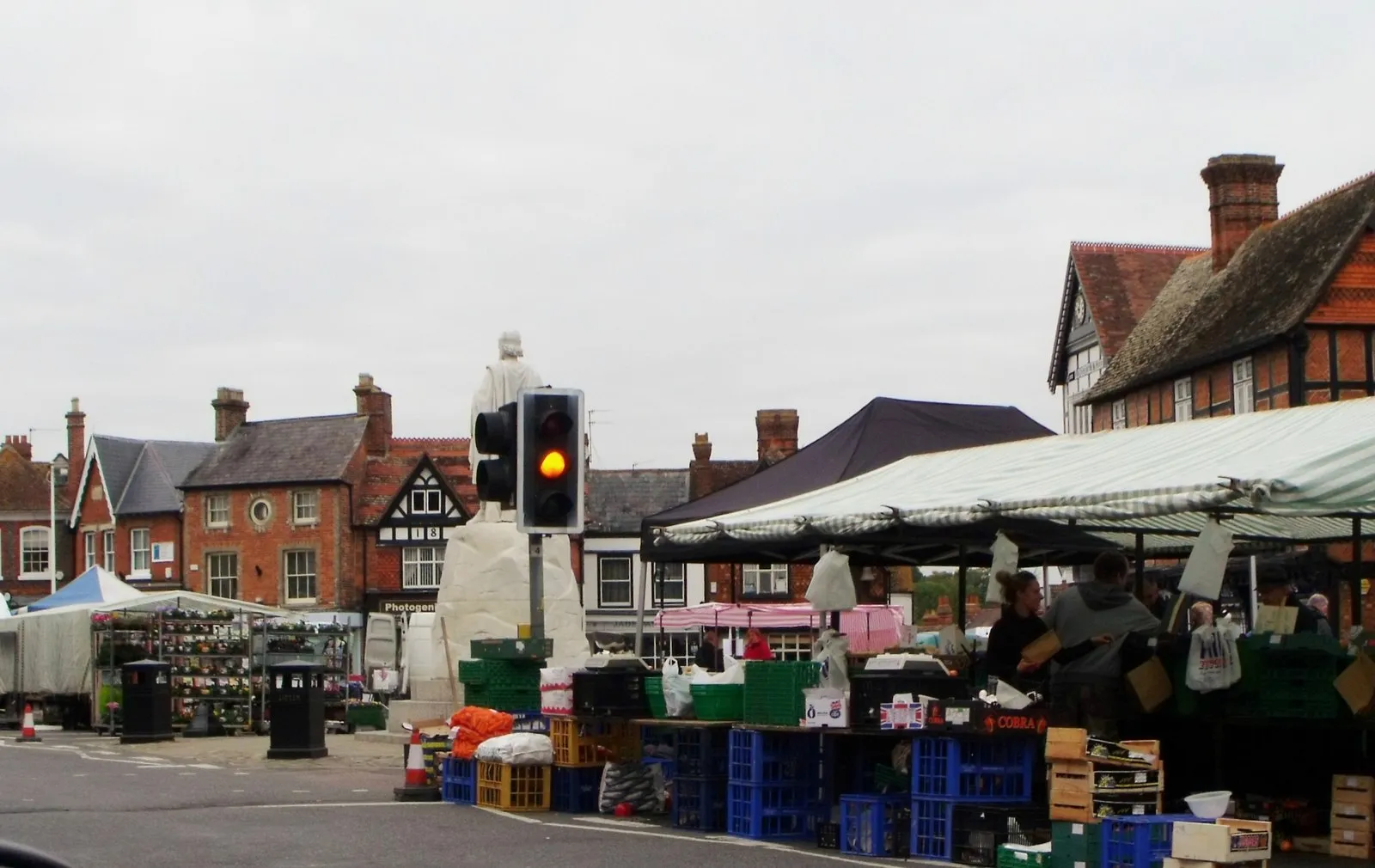 Market Place in Wantage, Oxfordshire, with the King Alfred statue and surrounding shopfronts