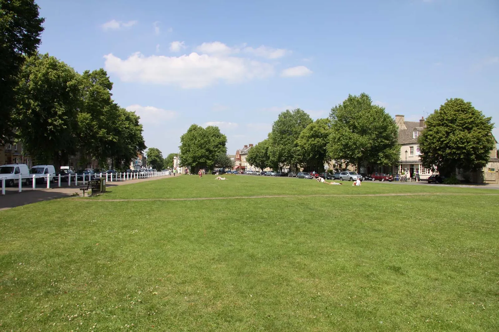 Church Green in Witney, Oxfordshire, with St Mary's Church and Cotswold stone buildings